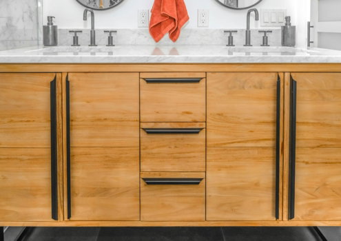 brown wooden cabinet with mirror